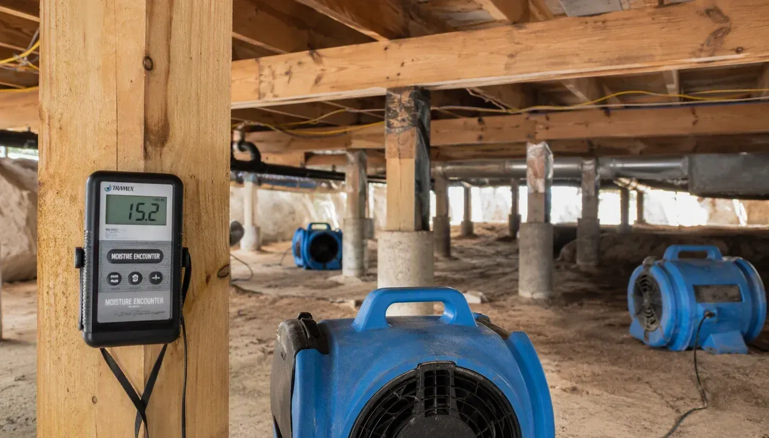 Structural drying with dehumidifiers and air movers in a Pensacola home
